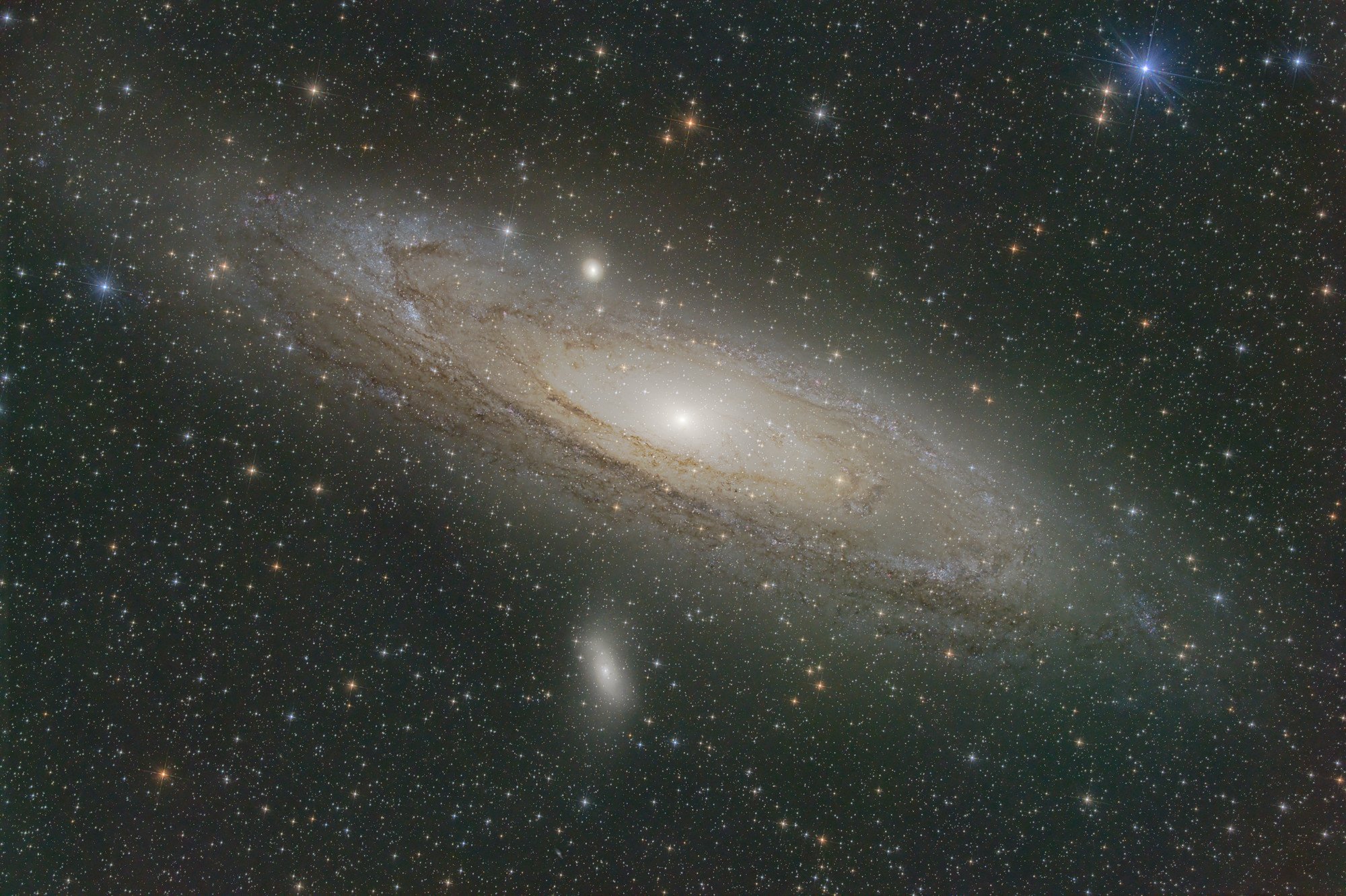 The Andromeda Galaxy, Messier 31, is the closest spiral galaxy to our Milky Way, around 2.5 million light-years away. It is located in the eponymous constellation Andromeda and is the most distant object that can be observed with the naked eye under good conditions without technical aids. The small galaxy to the left below Andromeda is Messier 110.